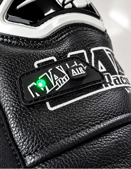 cuir moto airbag intégré avec led deporté sur le bras.